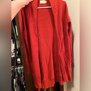 Burnt orange cardigan. Size M/L.